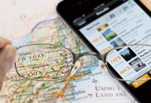 istock_rf_photo_of_reading_glasses_and_map